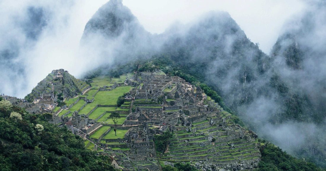 Misty Machu Picchu ruins in the Peruvian Andes — a flagship destination for affordable South American travel