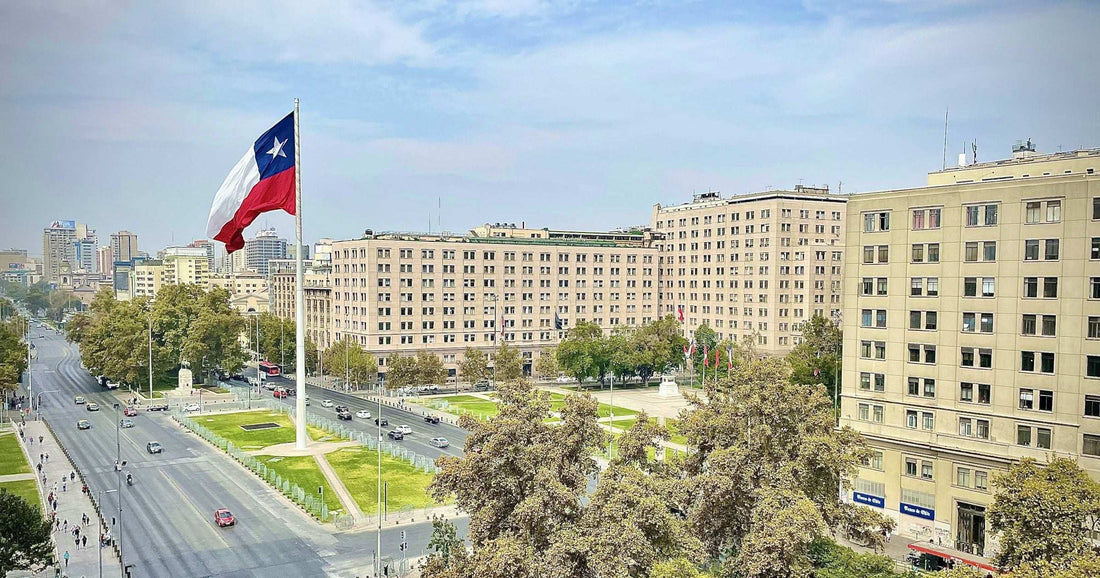Chilean flag flying over Plaza Bulnes and Santiago city centre — a 2026 safety overview of Chile.