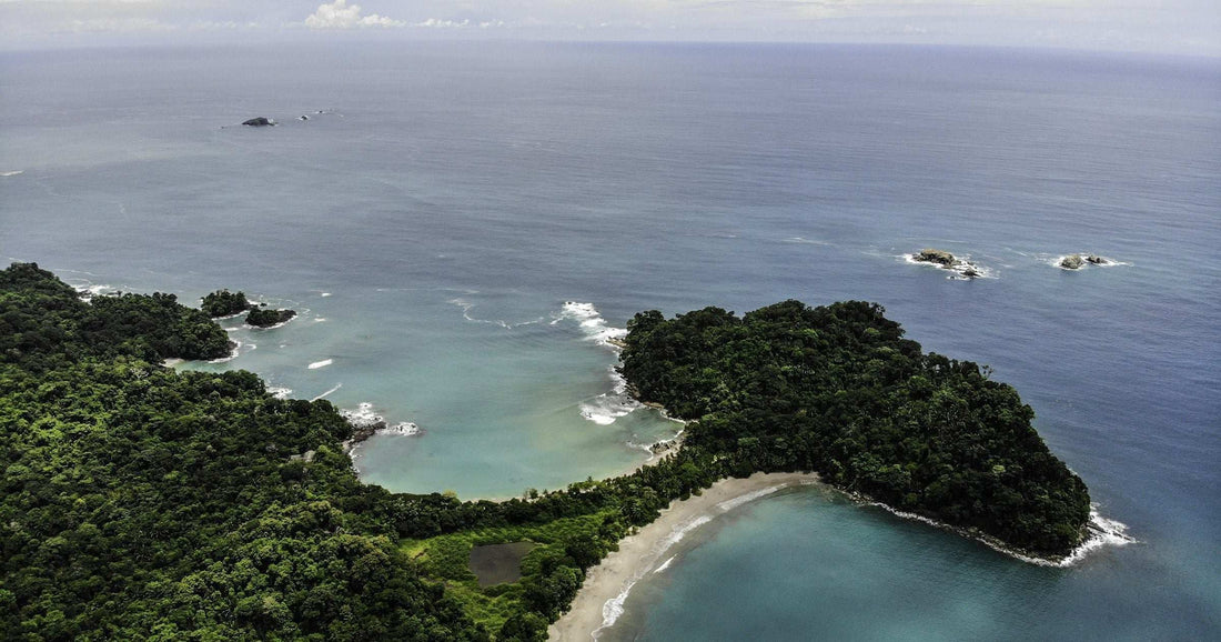 Aerial view of Manuel Antonio National Park's rainforest and Pacific coastline — Costa Rica remains one of Central America's safest travel destinations in 2026.