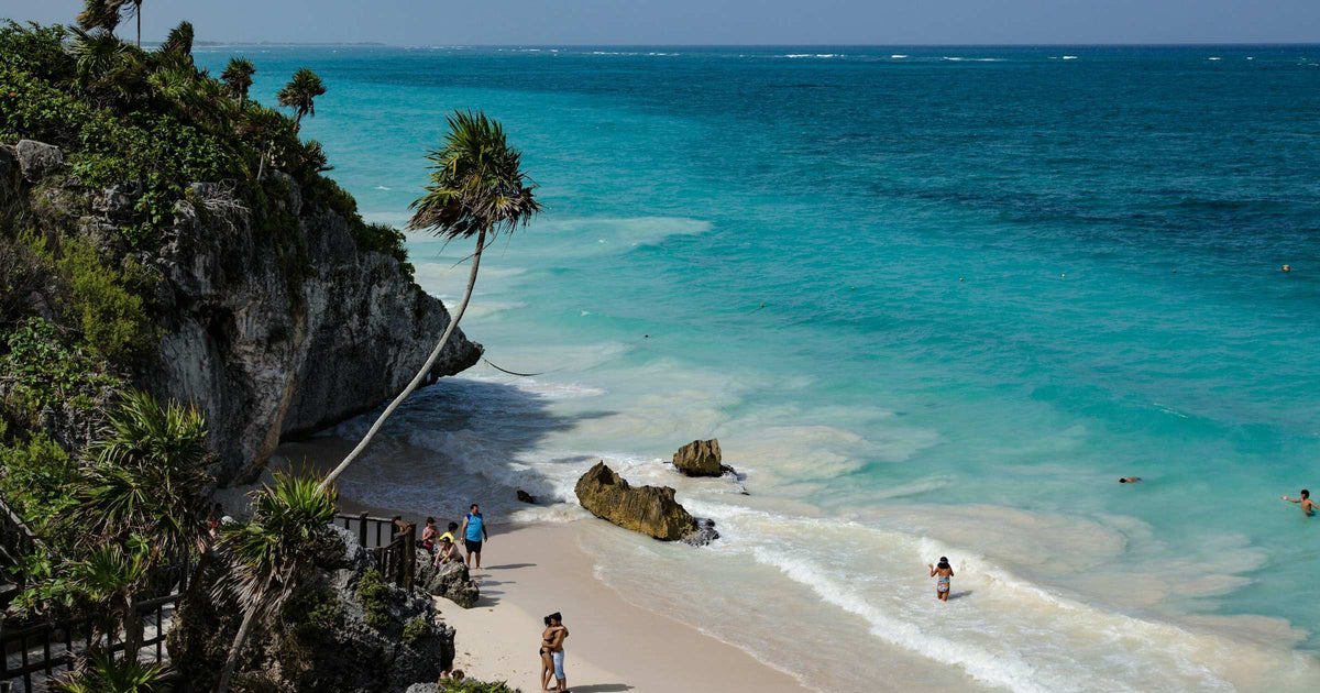 Ancient Tulum ruins overlooking the turquoise Caribbean coast in Mexico