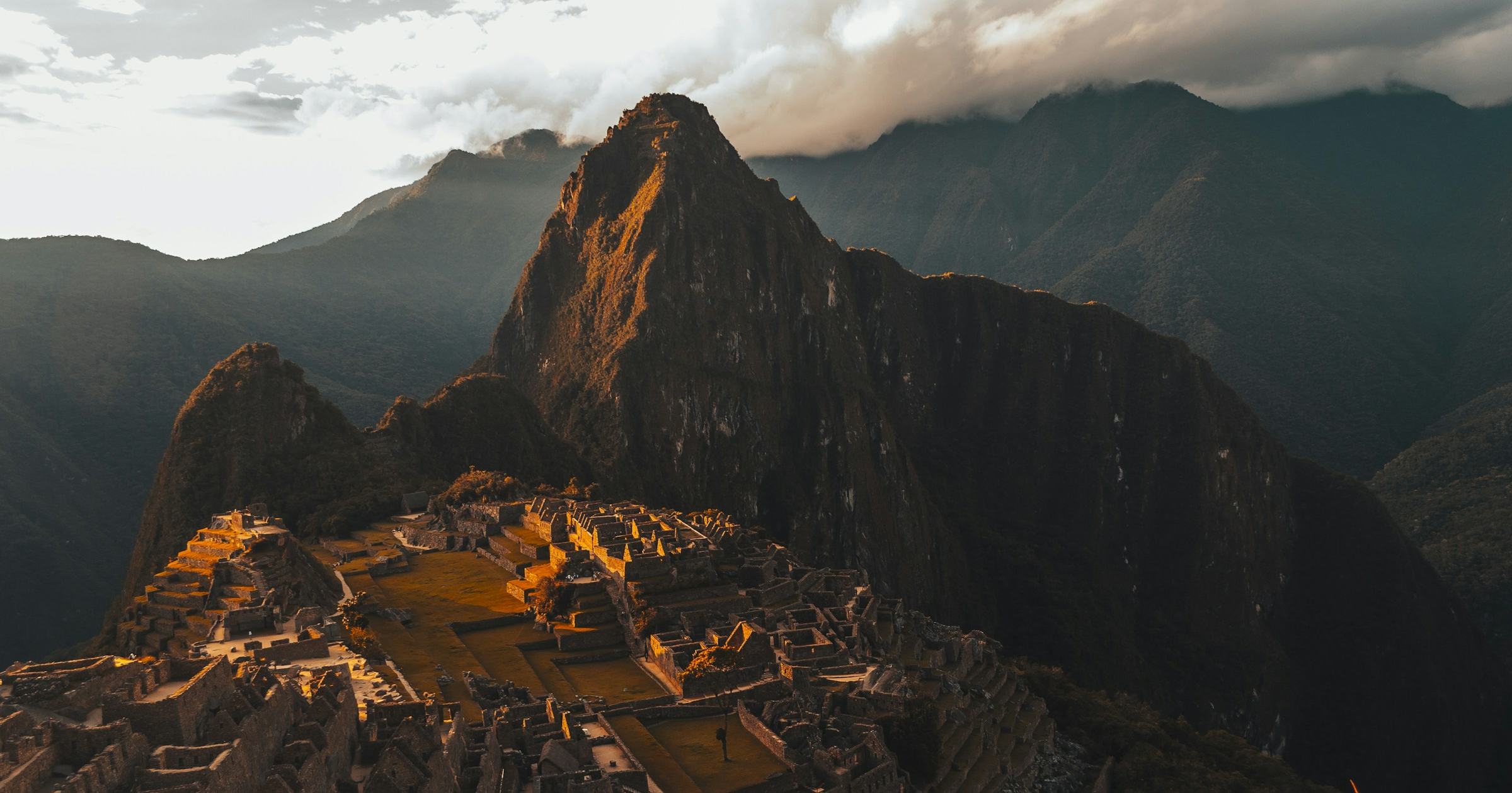 Machu Picchu citadel at dawn with Huayna Picchu mountain, Peru